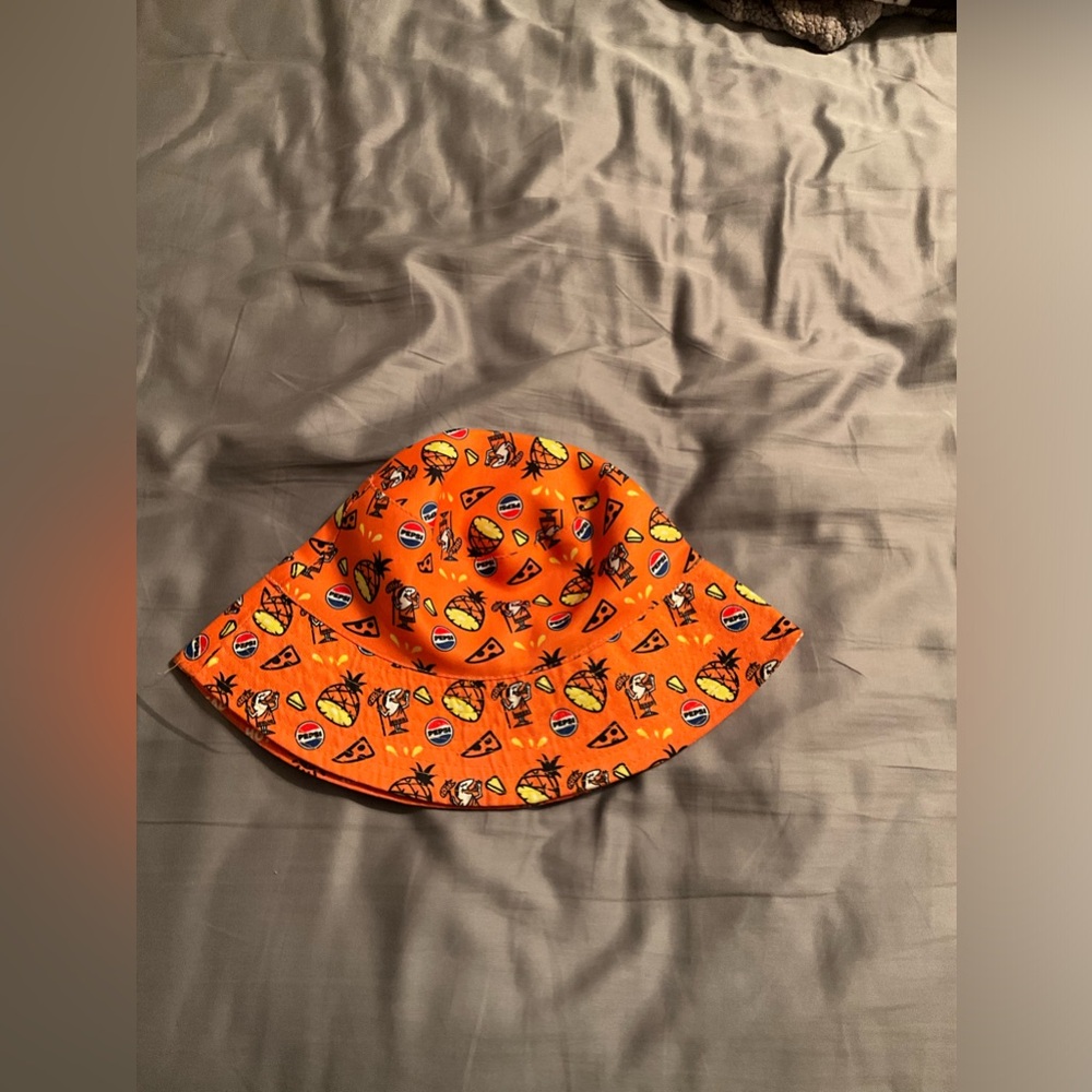 LIMITED EDITION LITTLE CEASER PINEAPPLE PEPSI BUCKET HAT
One Size fits all